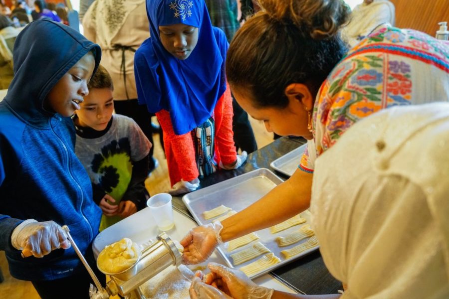 Children make Somali biscuits